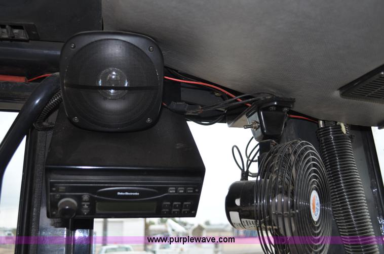 image for item C3027 2004 John Deere 772CH II motor grader