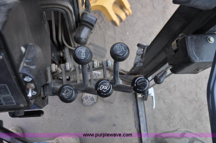 image for item C3027 2004 John Deere 772CH II motor grader