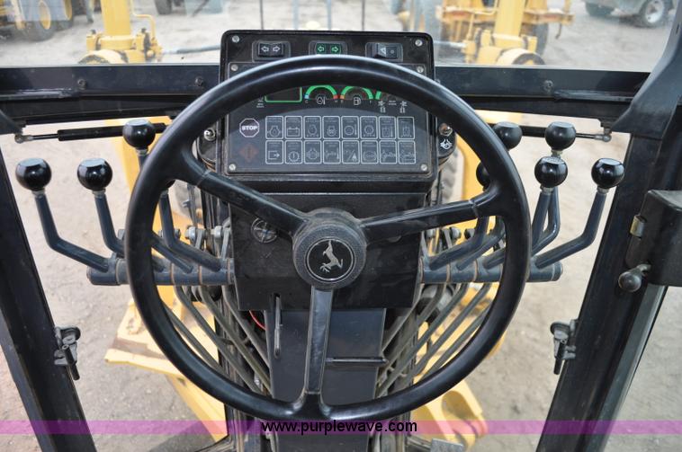 image for item C3027 2004 John Deere 772CH II motor grader