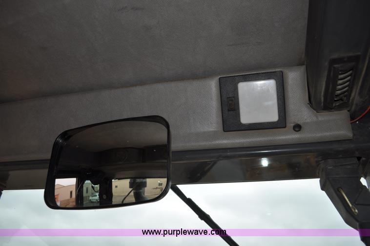 image for item C3027 2004 John Deere 772CH II motor grader