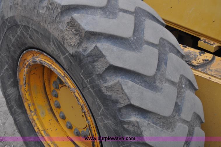 image for item C3027 2004 John Deere 772CH II motor grader