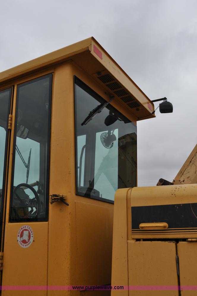 image for item C3028 John Deere 772BH motor grader