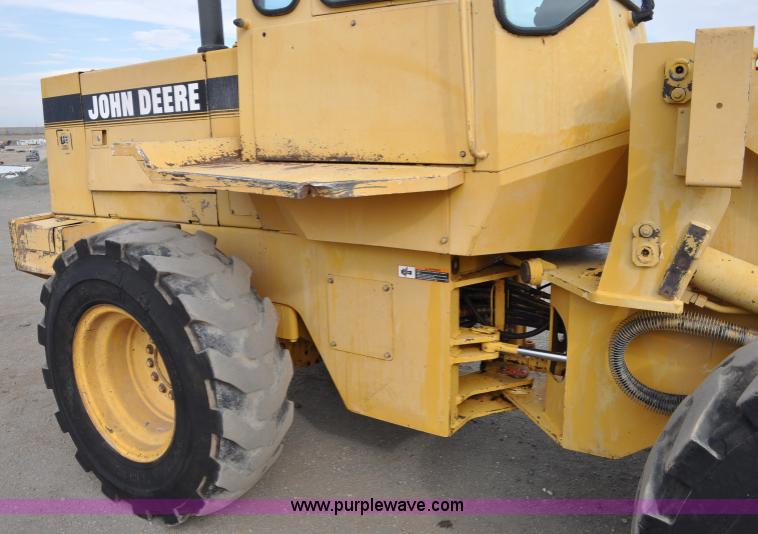 image for item C3029 1988 John Deere 444E articulated wheel loader