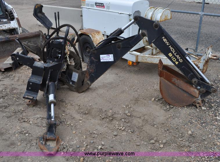 New Holland B104 backhoe skid steer attachment in Brighton, CO Item