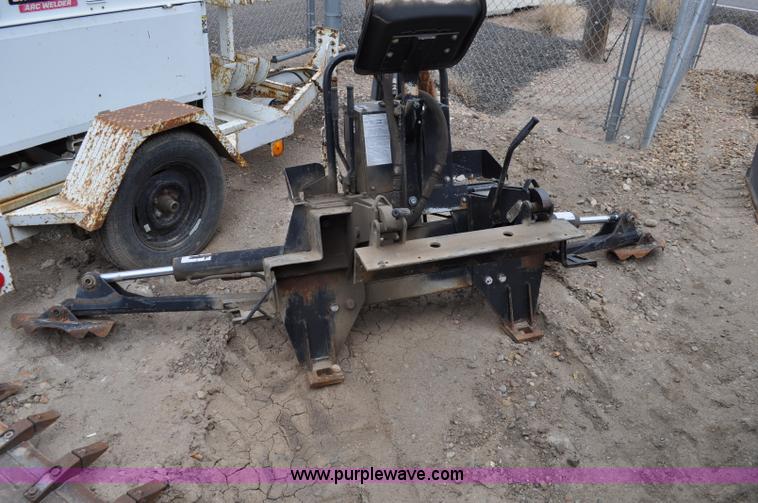 image for item C3033 New Holland B-104 backhoe skid steer attachment