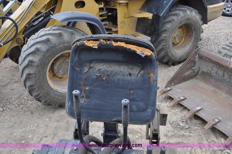 image for item C3033 New Holland B-104 backhoe skid steer attachment