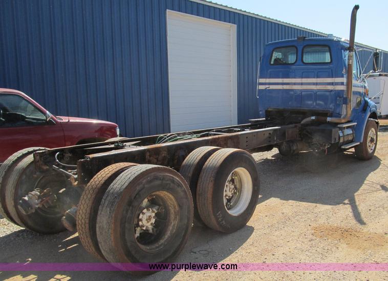 image for item F4605 1997 Ford Louisville 113 semi truck cab and chassis