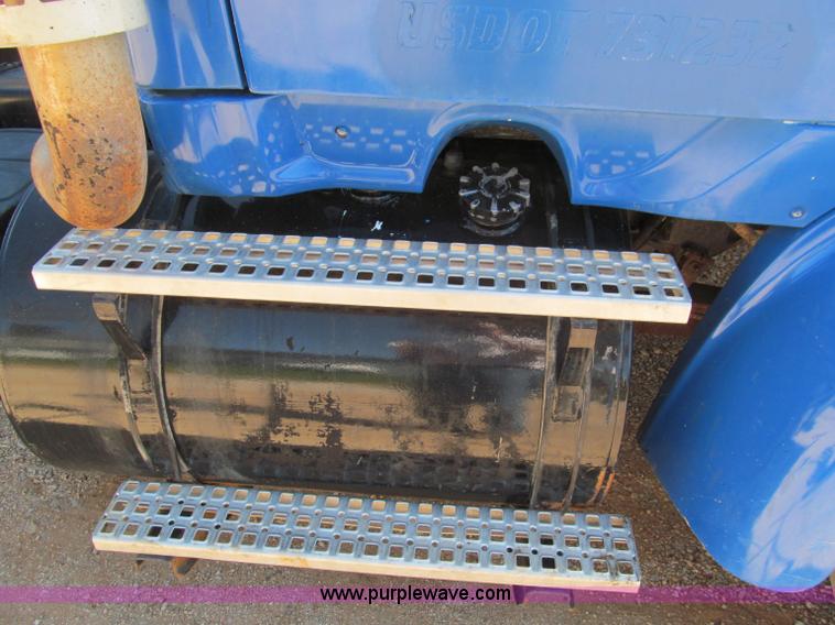 image for item F4605 1997 Ford Louisville 113 semi truck cab and chassis