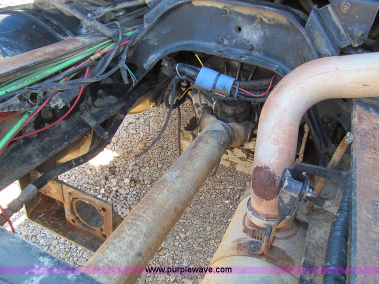 image for item F4605 1997 Ford Louisville 113 semi truck cab and chassis