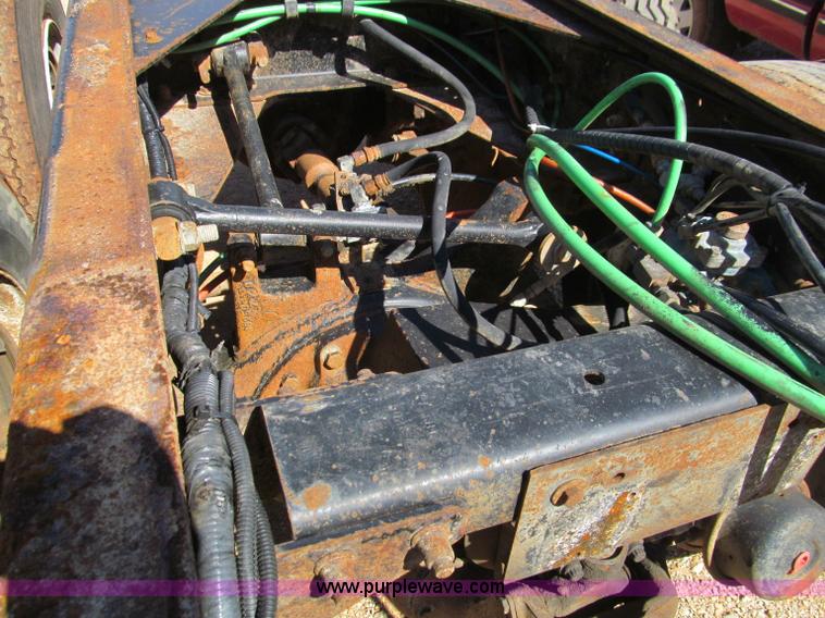 image for item F4605 1997 Ford Louisville 113 semi truck cab and chassis