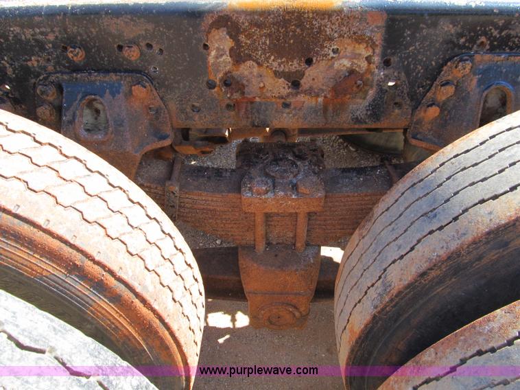 image for item F4605 1997 Ford Louisville 113 semi truck cab and chassis