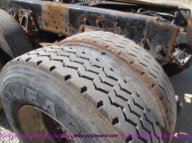 image for item F4605 1997 Ford Louisville 113 semi truck cab and chassis