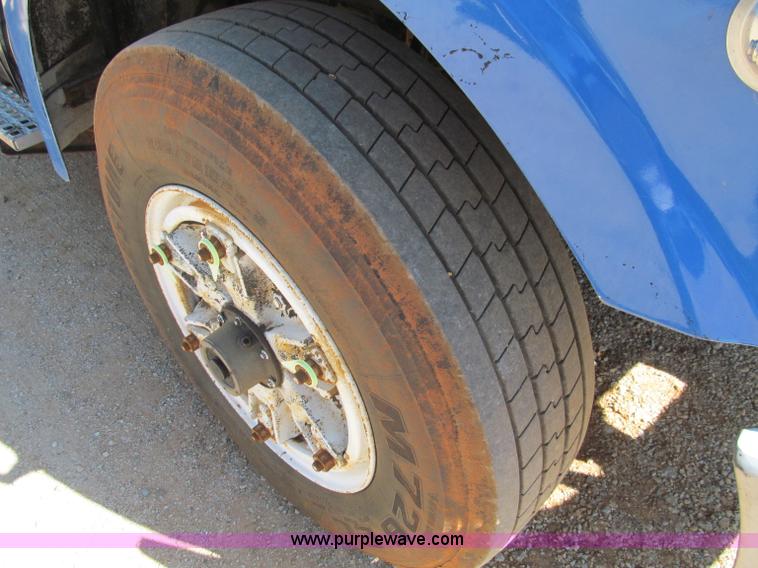 image for item F4605 1997 Ford Louisville 113 semi truck cab and chassis