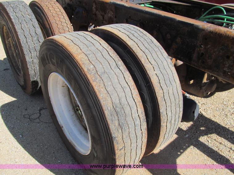 image for item F4605 1997 Ford Louisville 113 semi truck cab and chassis