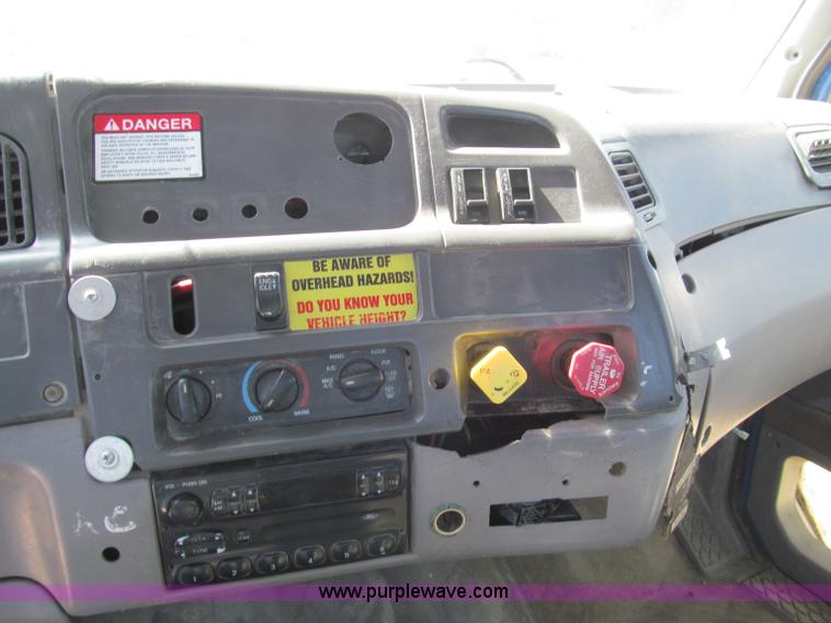 image for item F4605 1997 Ford Louisville 113 semi truck cab and chassis