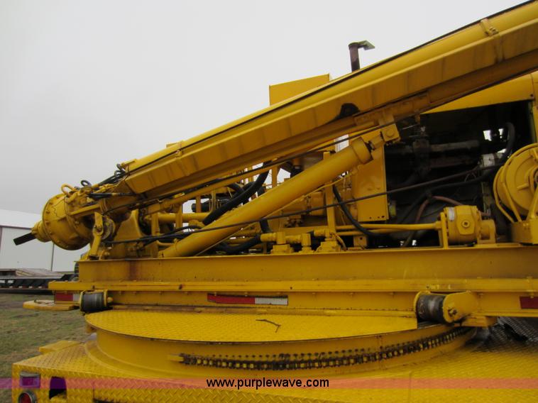 image for item A5618 1975 GMC 6000 drilling truck