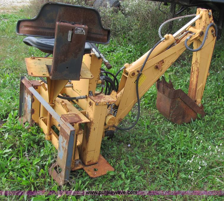 Case D100 backhoe skid steer attachment in Wright City, MO Item B2893 sold Purple Wave