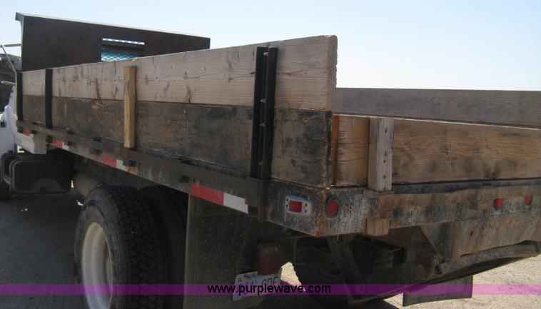 image for item B8168 1999 Ford F800 flatbed truck
