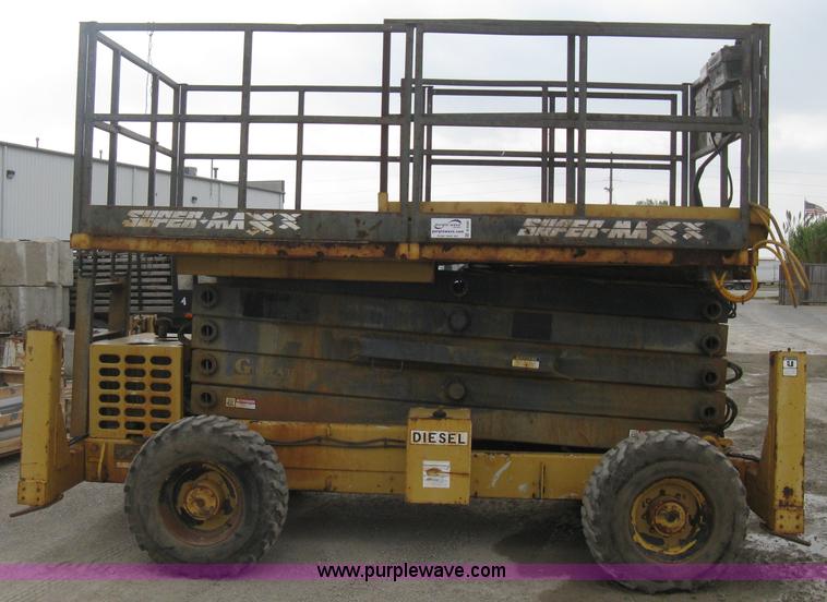 image for item B8295 1995 Grove SuperMax SM4688XT rough terrain scissor lift