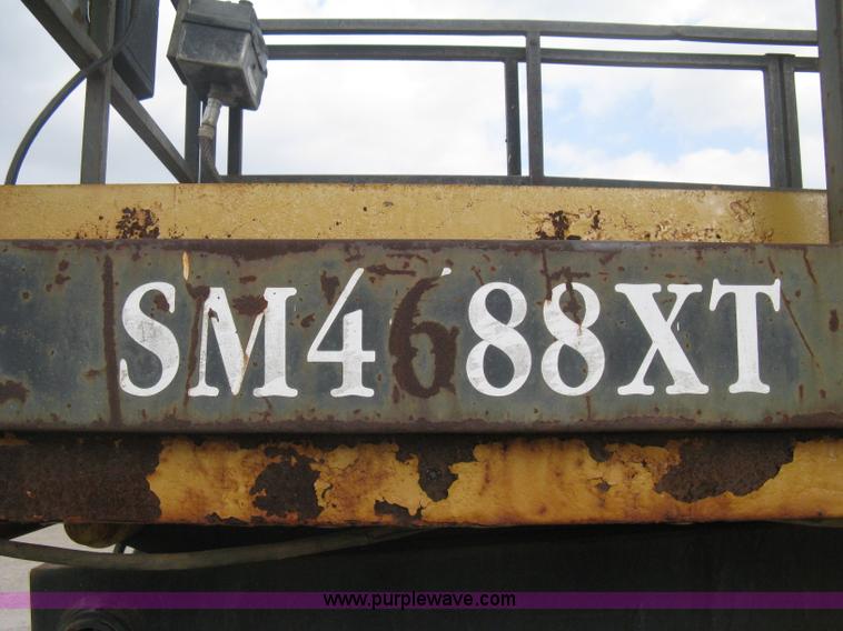 image for item B8295 1995 Grove SuperMax SM4688XT rough terrain scissor lift