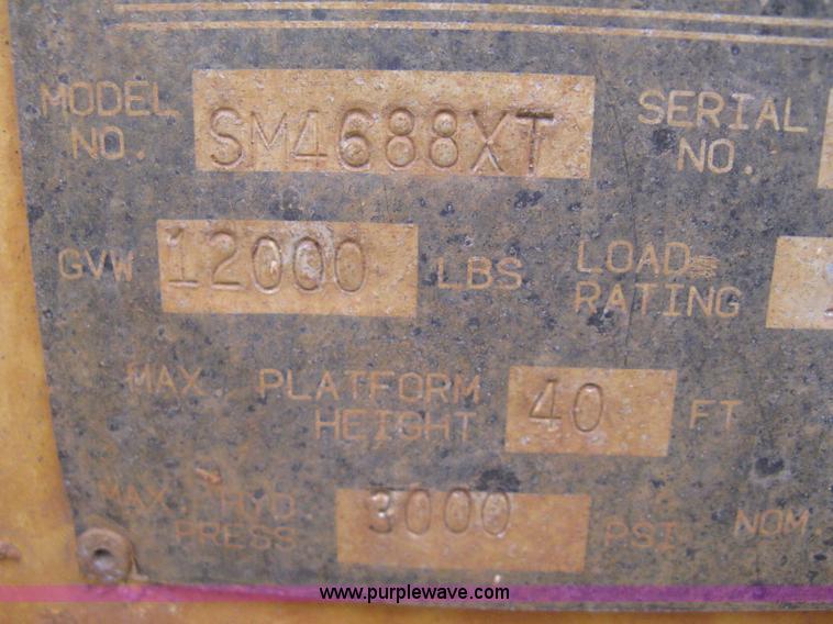 image for item B8295 1995 Grove SuperMax SM4688XT rough terrain scissor lift