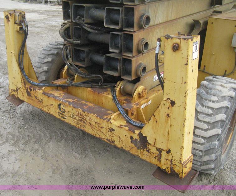 image for item B8295 1995 Grove SuperMax SM4688XT rough terrain scissor lift