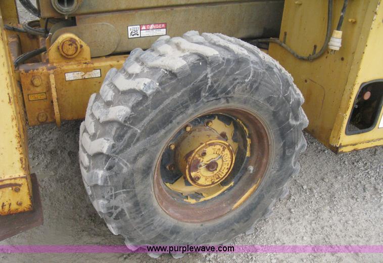 image for item B8295 1995 Grove SuperMax SM4688XT rough terrain scissor lift