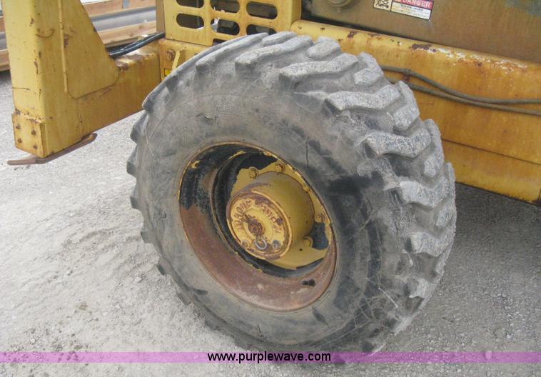 image for item B8295 1995 Grove SuperMax SM4688XT rough terrain scissor lift