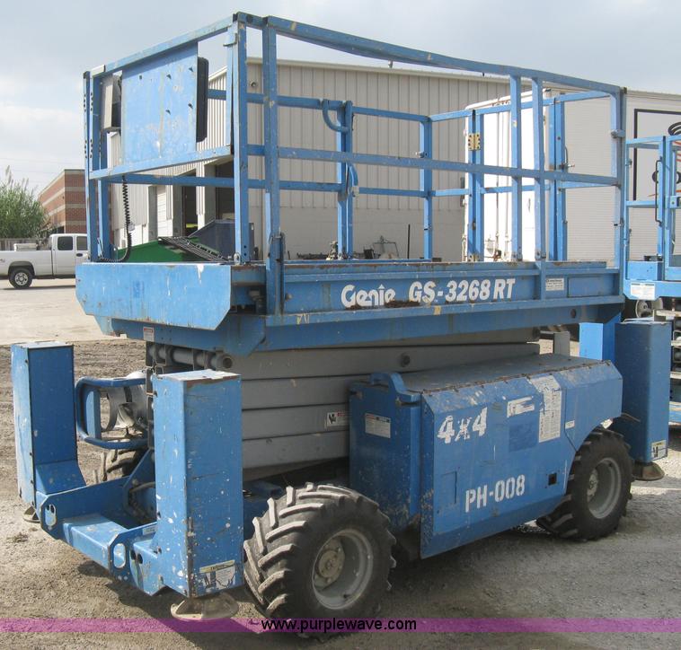 image for item B8298 2001 Genie GS-3268RT rough terrain scissor lift