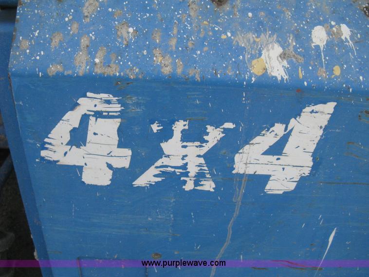 image for item B8298 2001 Genie GS-3268RT rough terrain scissor lift