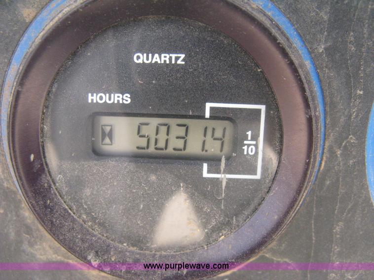 image for item B8298 2001 Genie GS-3268RT rough terrain scissor lift