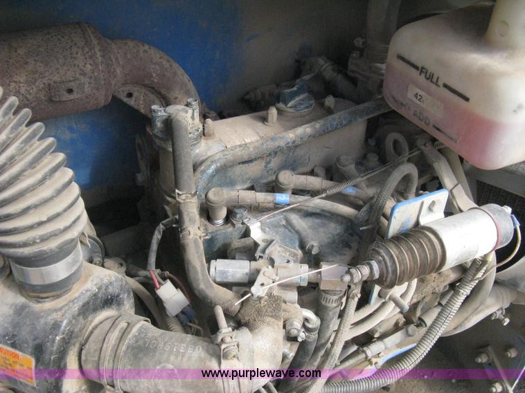 image for item B8298 2001 Genie GS-3268RT rough terrain scissor lift