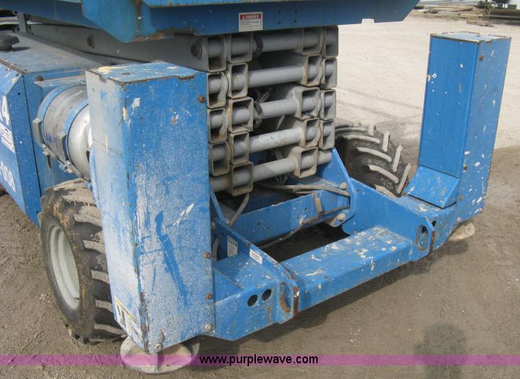 image for item B8298 2001 Genie GS-3268RT rough terrain scissor lift