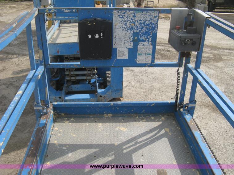 image for item B8298 2001 Genie GS-3268RT rough terrain scissor lift