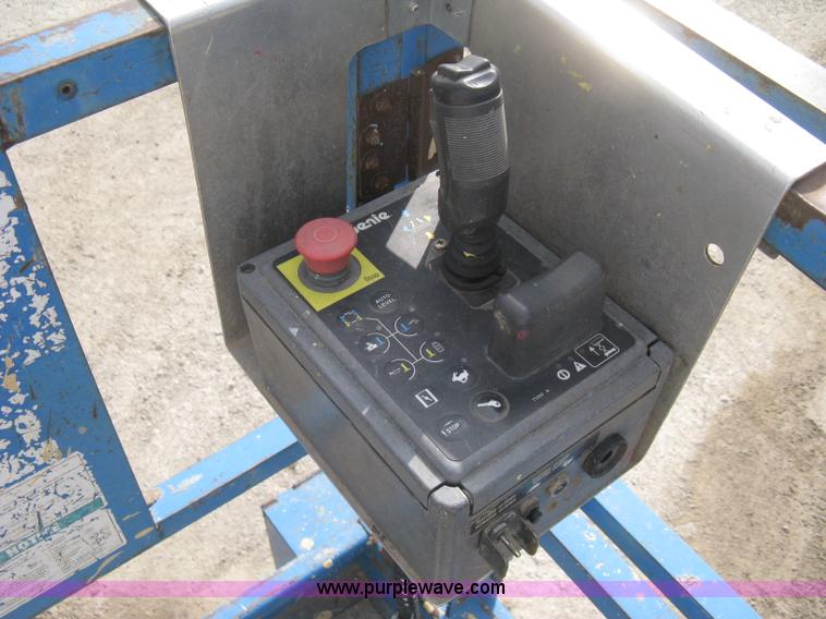 image for item B8298 2001 Genie GS-3268RT rough terrain scissor lift