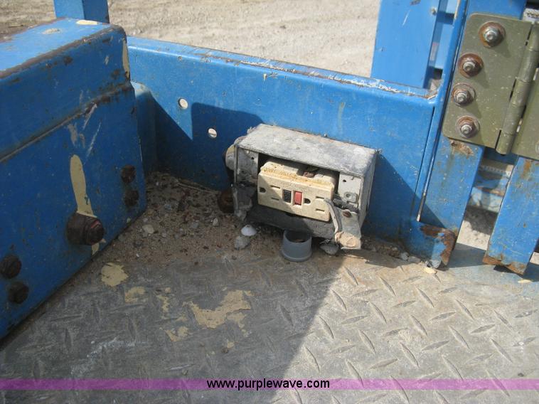 image for item B8298 2001 Genie GS-3268RT rough terrain scissor lift