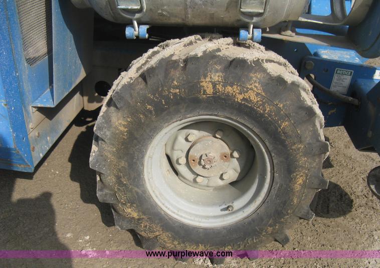 image for item B8298 2001 Genie GS-3268RT rough terrain scissor lift