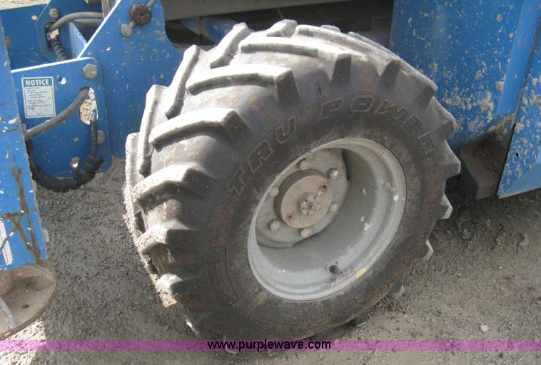 image for item B8298 2001 Genie GS-3268RT rough terrain scissor lift