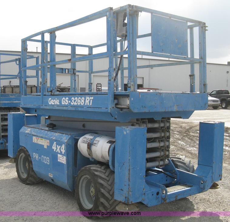 image for item B8299 2003 Genie GS-3268RT rough terrain scissor lift