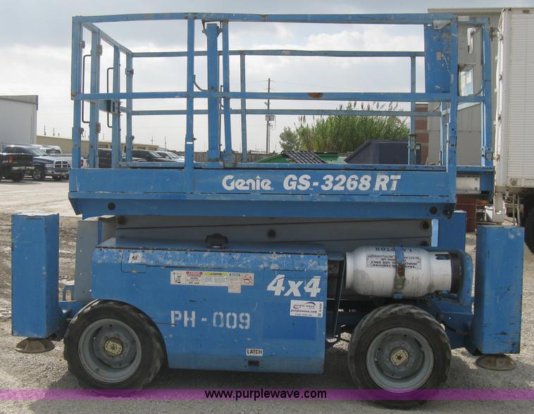 image for item B8299 2003 Genie GS-3268RT rough terrain scissor lift
