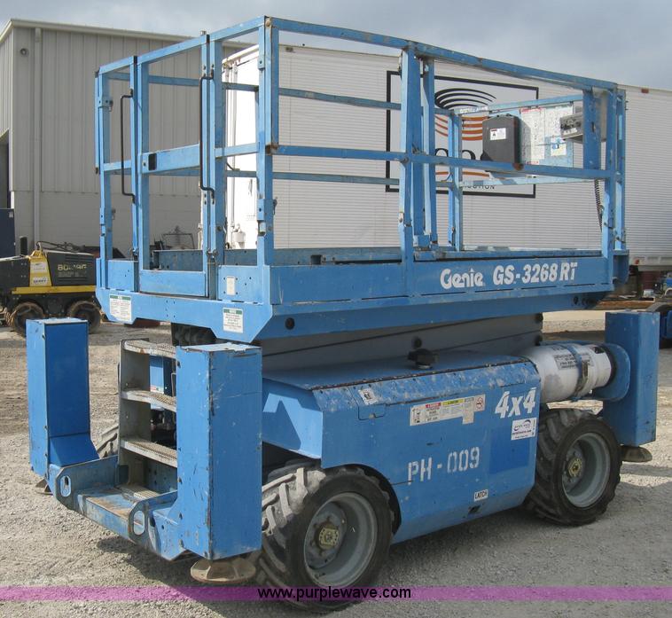 image for item B8299 2003 Genie GS-3268RT rough terrain scissor lift