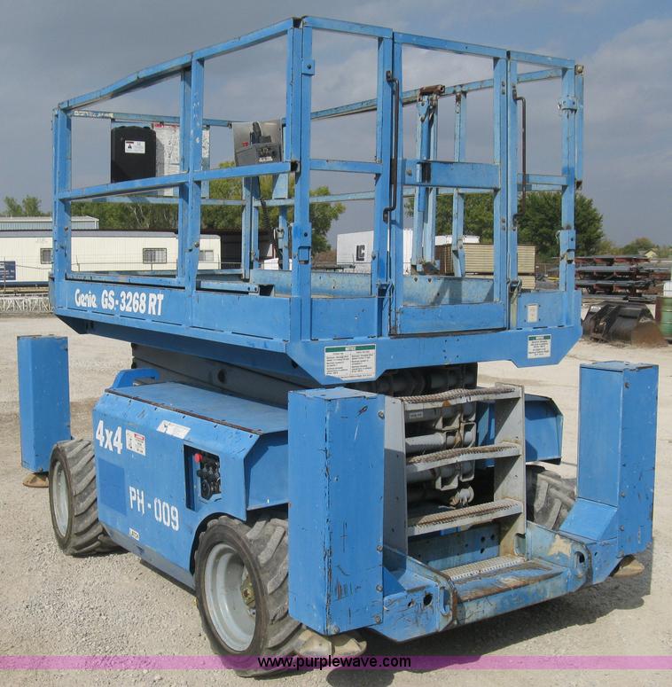 image for item B8299 2003 Genie GS-3268RT rough terrain scissor lift
