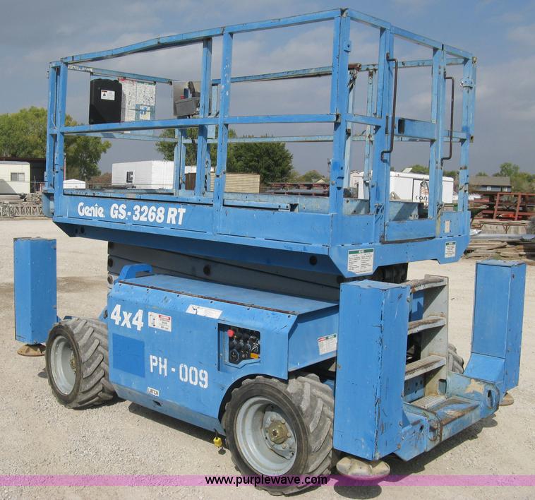 image for item B8299 2003 Genie GS-3268RT rough terrain scissor lift