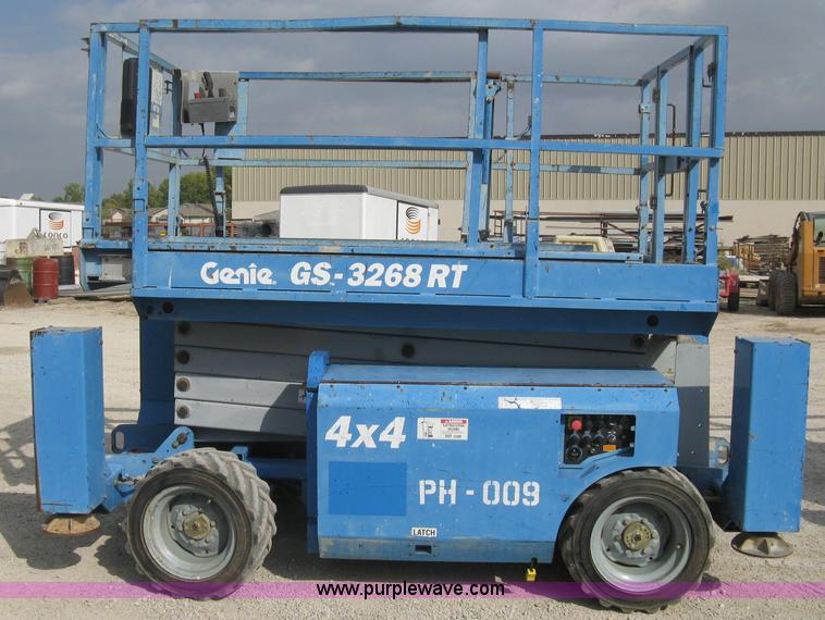 image for item B8299 2003 Genie GS-3268RT rough terrain scissor lift