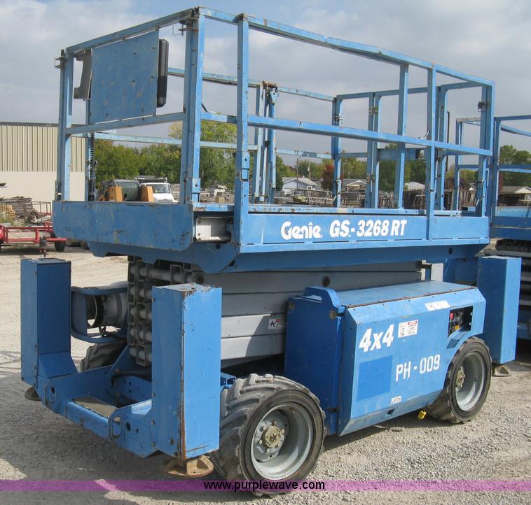 image for item B8299 2003 Genie GS-3268RT rough terrain scissor lift