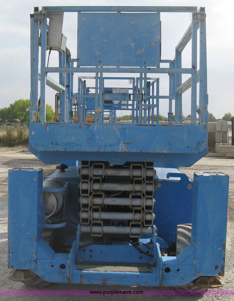 image for item B8299 2003 Genie GS-3268RT rough terrain scissor lift