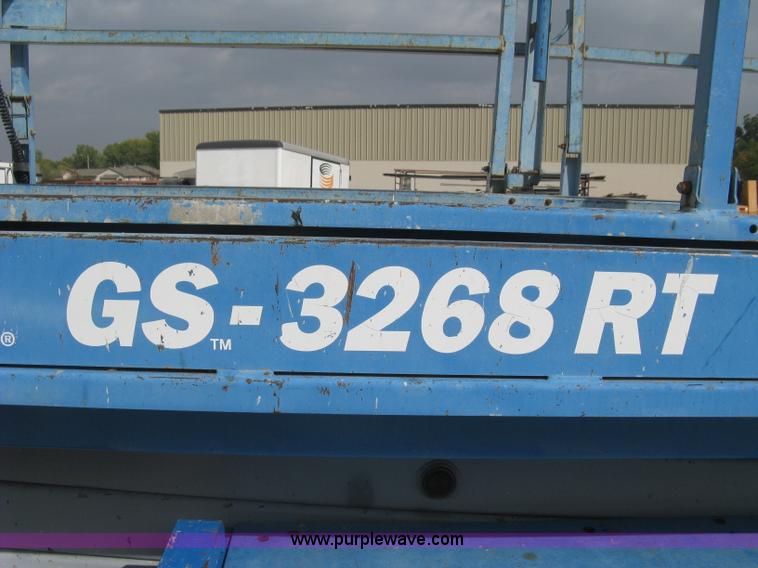 image for item B8299 2003 Genie GS-3268RT rough terrain scissor lift