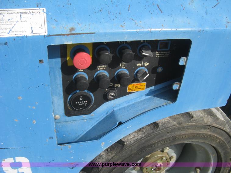image for item B8299 2003 Genie GS-3268RT rough terrain scissor lift