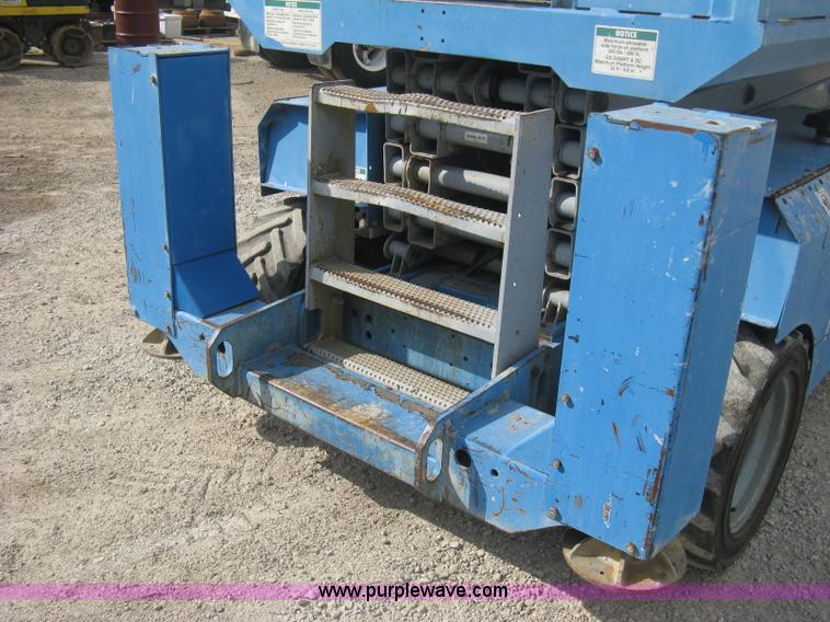 image for item B8299 2003 Genie GS-3268RT rough terrain scissor lift