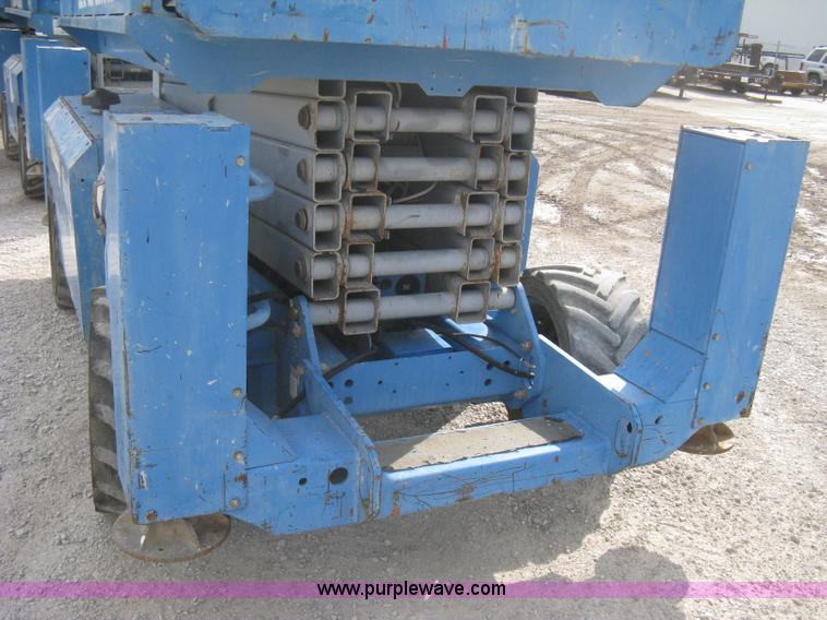 image for item B8299 2003 Genie GS-3268RT rough terrain scissor lift